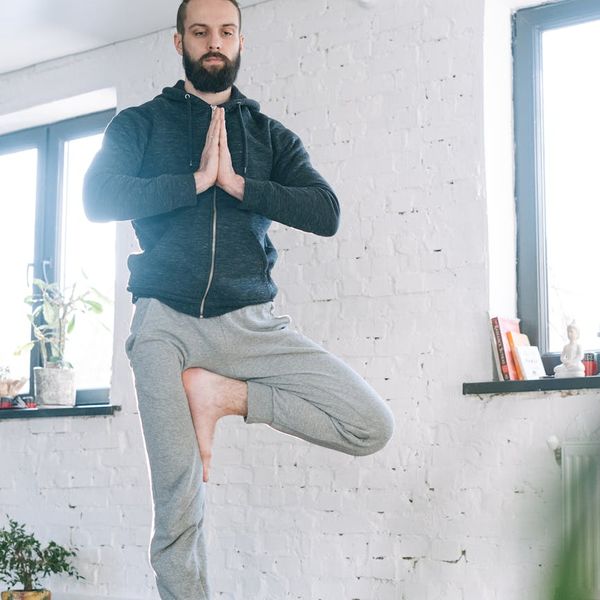 Person in a calm, focused state during an exercise routine.